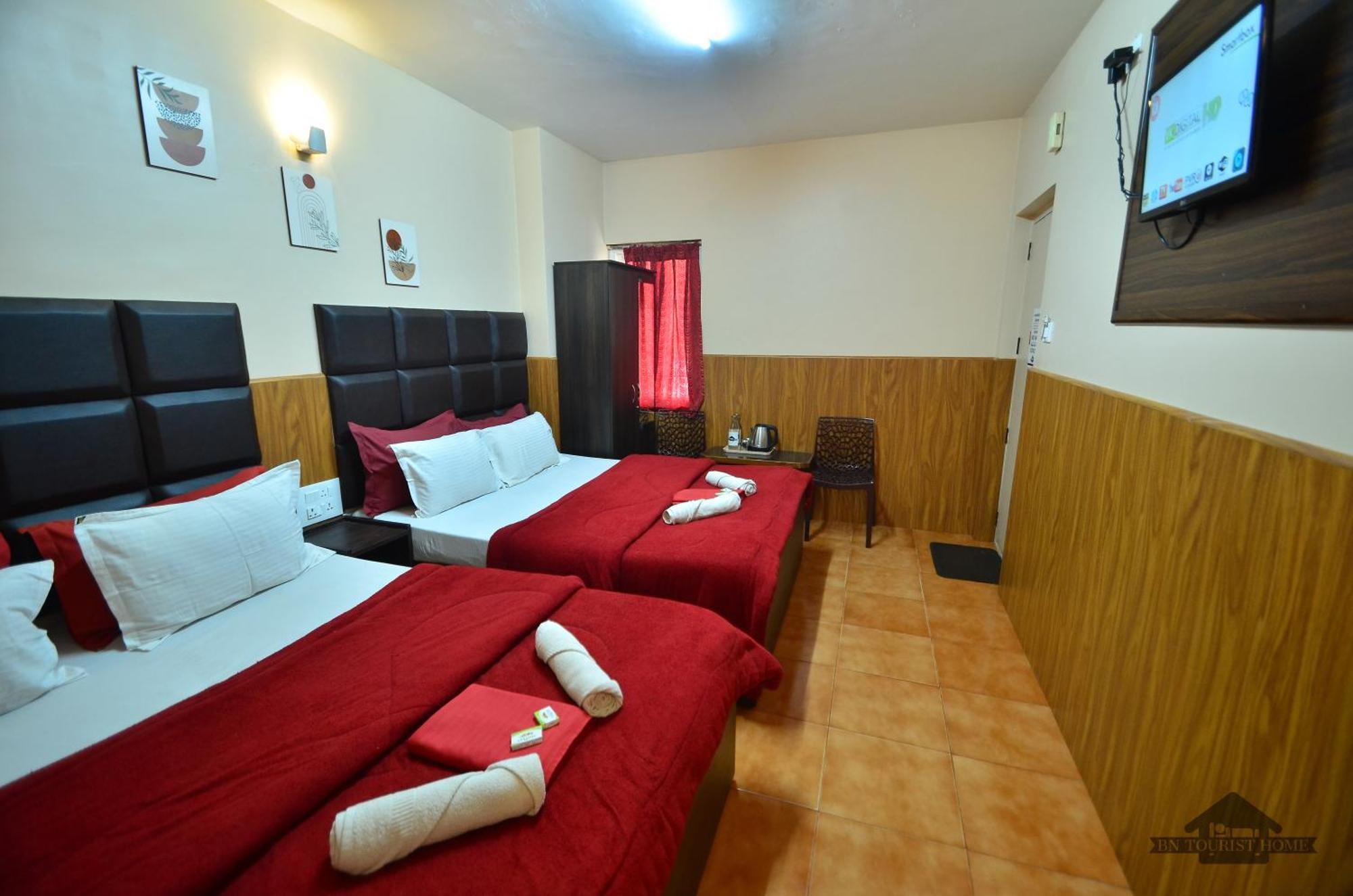 Bn Tourist Home Уті Номер фото